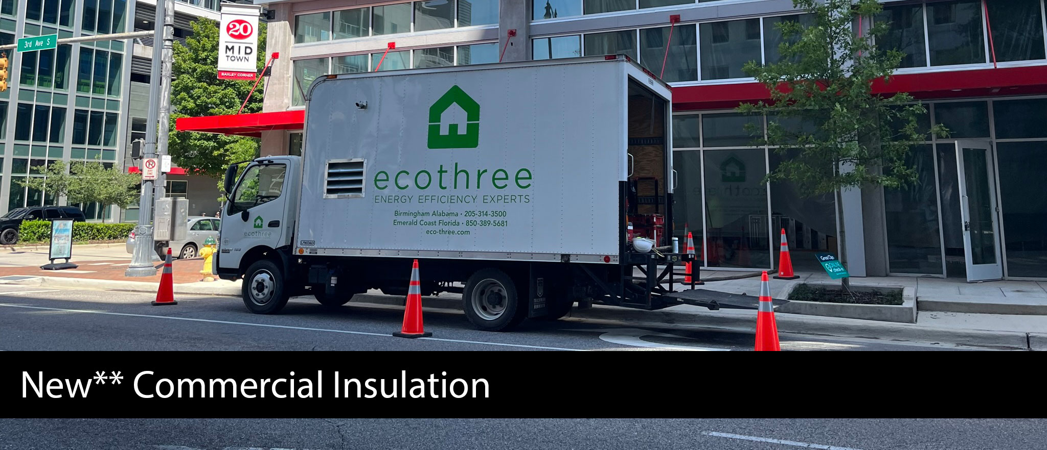 Eco Three van out in front of a business